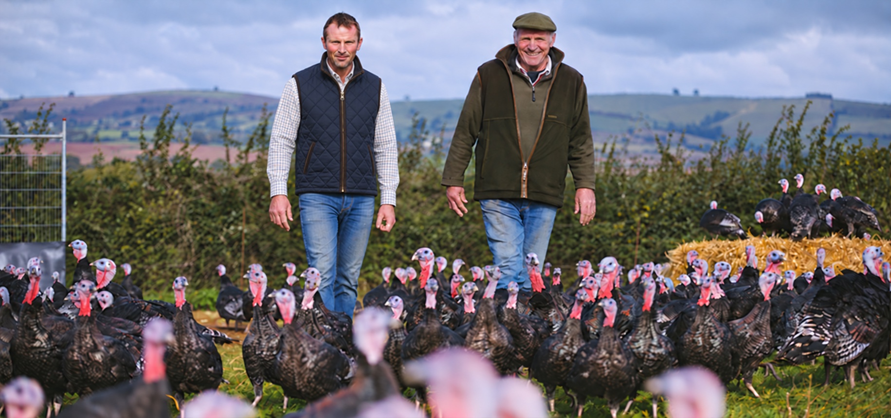 Two generations of the Leach family with their free-range turkeys at Glebelands Farm