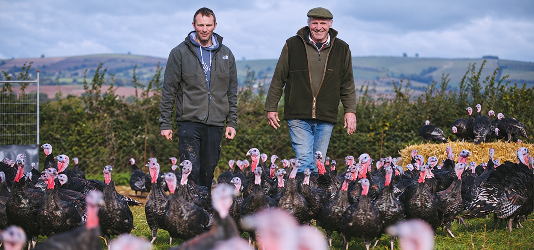 Two generations of the Leach family with their free-range turkeys at Glebelands Farm
